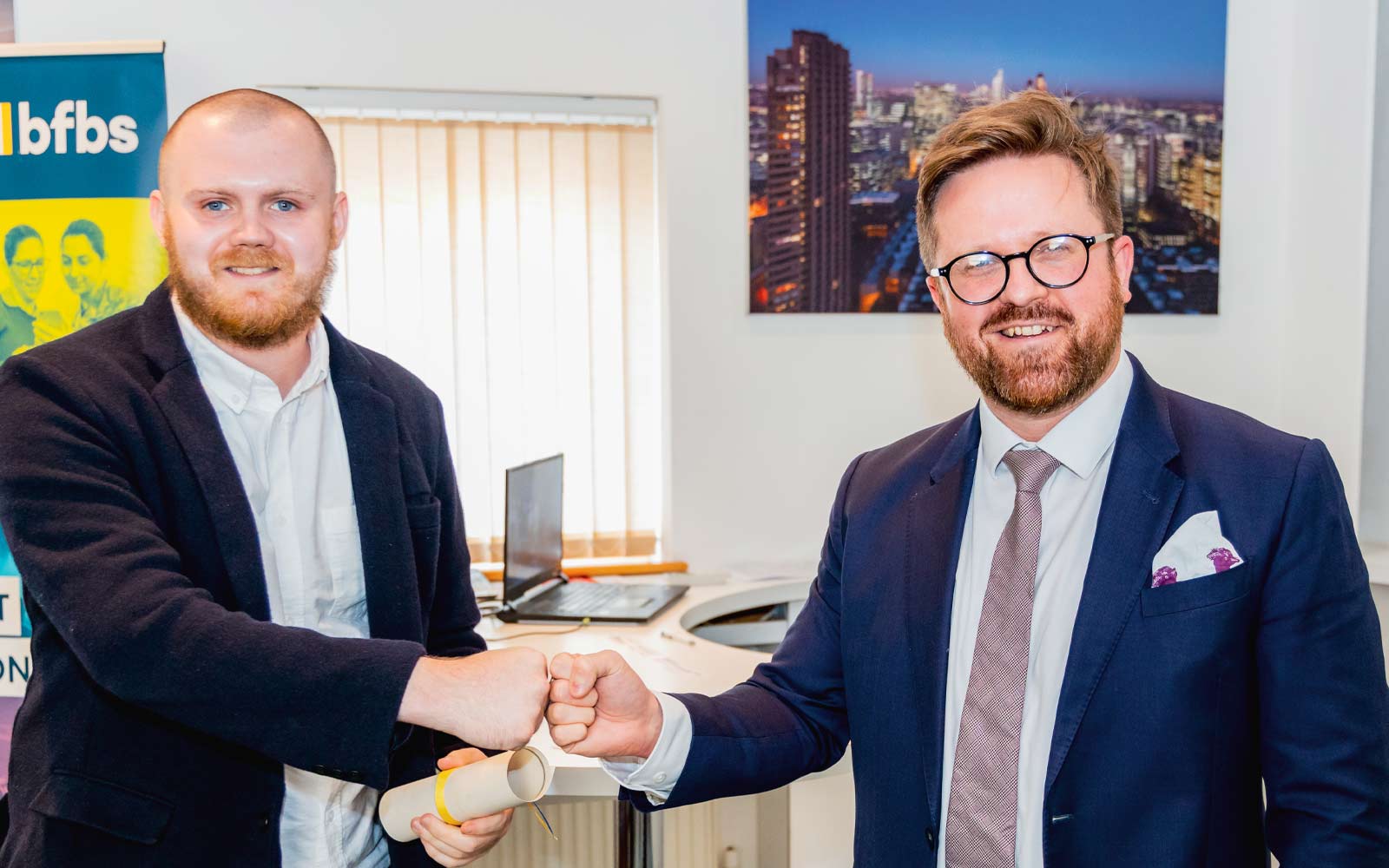 BFBS graduate receiving their certificate.