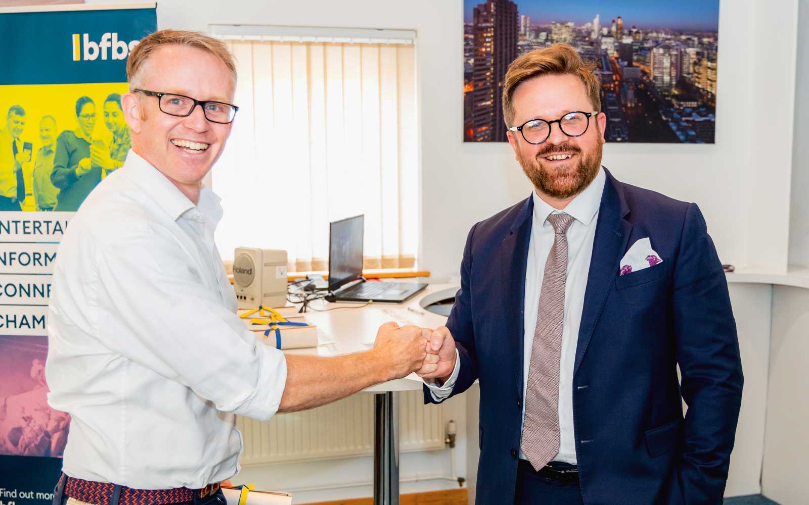 BFBS graduate receiving their certificate.