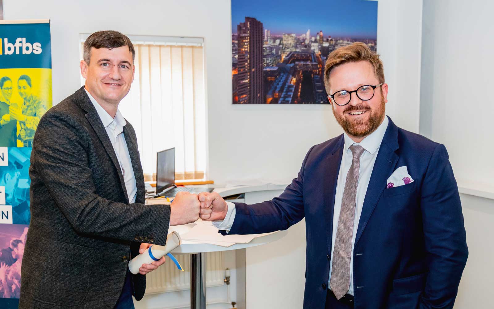 BFBS graduate receiving their certificate.