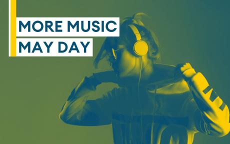 Person listening to music on headphones.