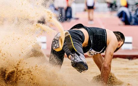 Para athlete taking part on long jump.