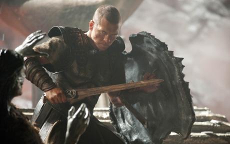 Movie still from the film Clash of the Titans. Close of character holding a sword and shield.