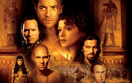 Movie poster for the film the Mummy Returns. Lots of character headshots set to an Egyptian tomb background.