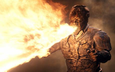 Movie still from the film the Mummy: Tomb of the Dragon Emperor. Close up of a character breathing fire.