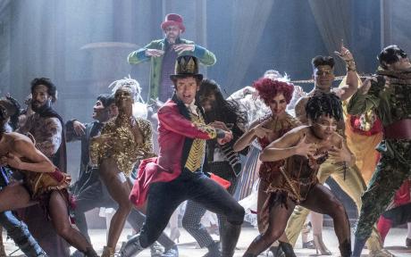 Movie still from the film the Greatest Showman. Group of people dancing.