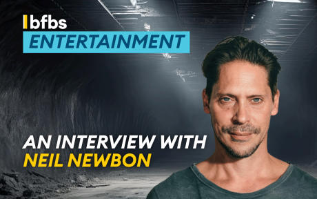 PR photo of gaming legend Neil Newbon, text 'an interview with Neil Newbon'.