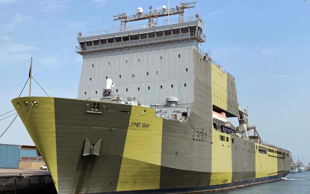 Close up of a Royal Navy ship, black and yellow colours.